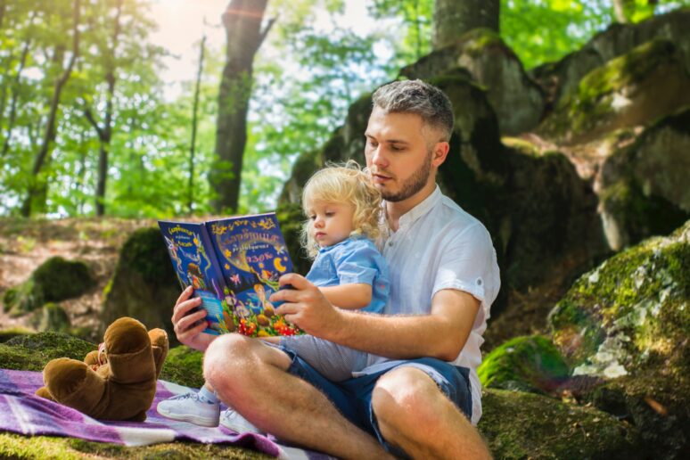 Photo by Andy Kuzma: https://www.pexels.com/photo/photo-of-man-and-child-reading-book-during-daytime-2801567/