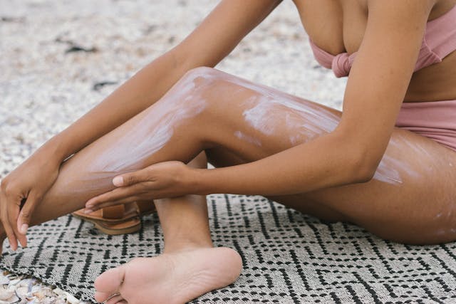 Photo by RF._.studio: https://www.pexels.com/photo/woman-seated-on-textile-applying-suncsreen-3618606/