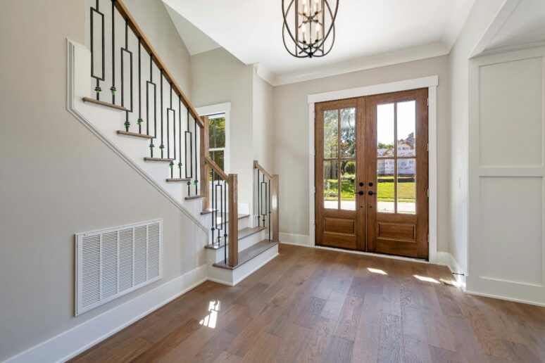 Photo by Curtis Adams: https://www.pexels.com/photo/wooden-main-door-of-a-house-10099331/