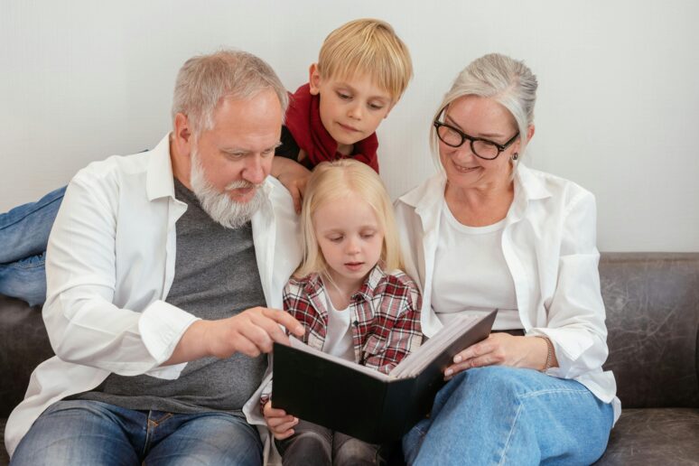 Photo by Mikhail Nilov: https://www.pexels.com/photo/a-family-looking-at-a-album-8307717/
